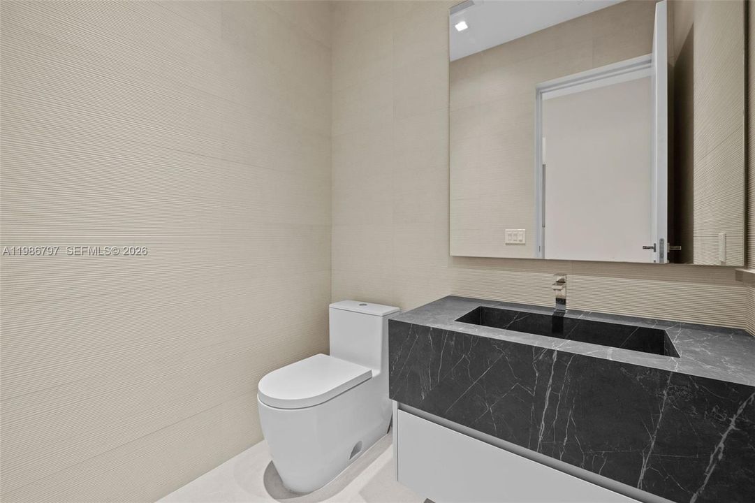 Powder Room - Located off Entry Foyer