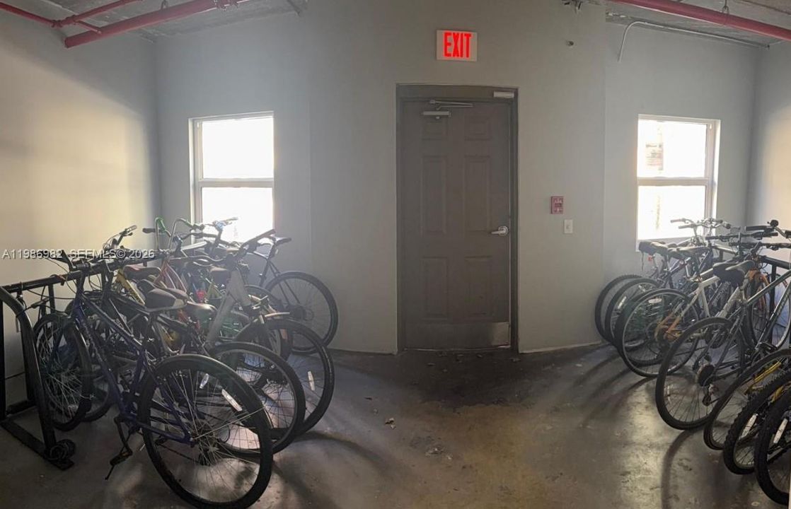Bicycle space as one heads for the elevator to the storage area.