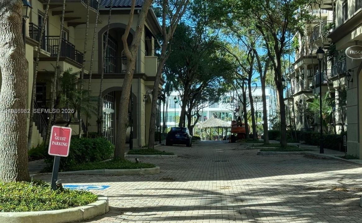 Very cozy Guests Parking area between the two buildings.