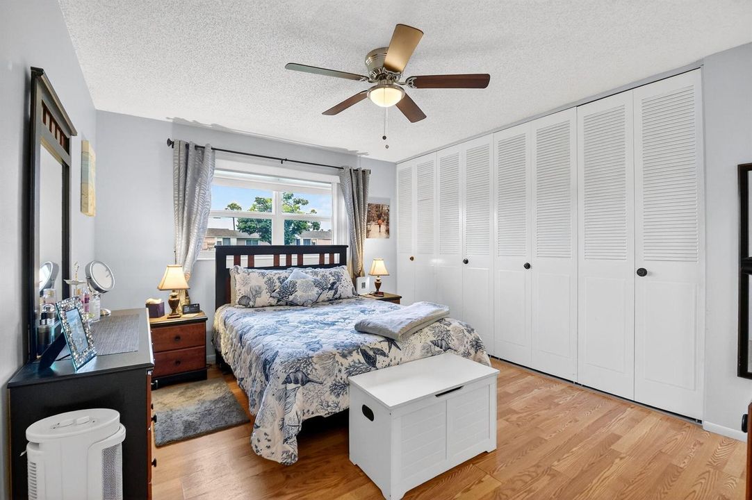 Large Bedroom With Wall-To-Wall Closets