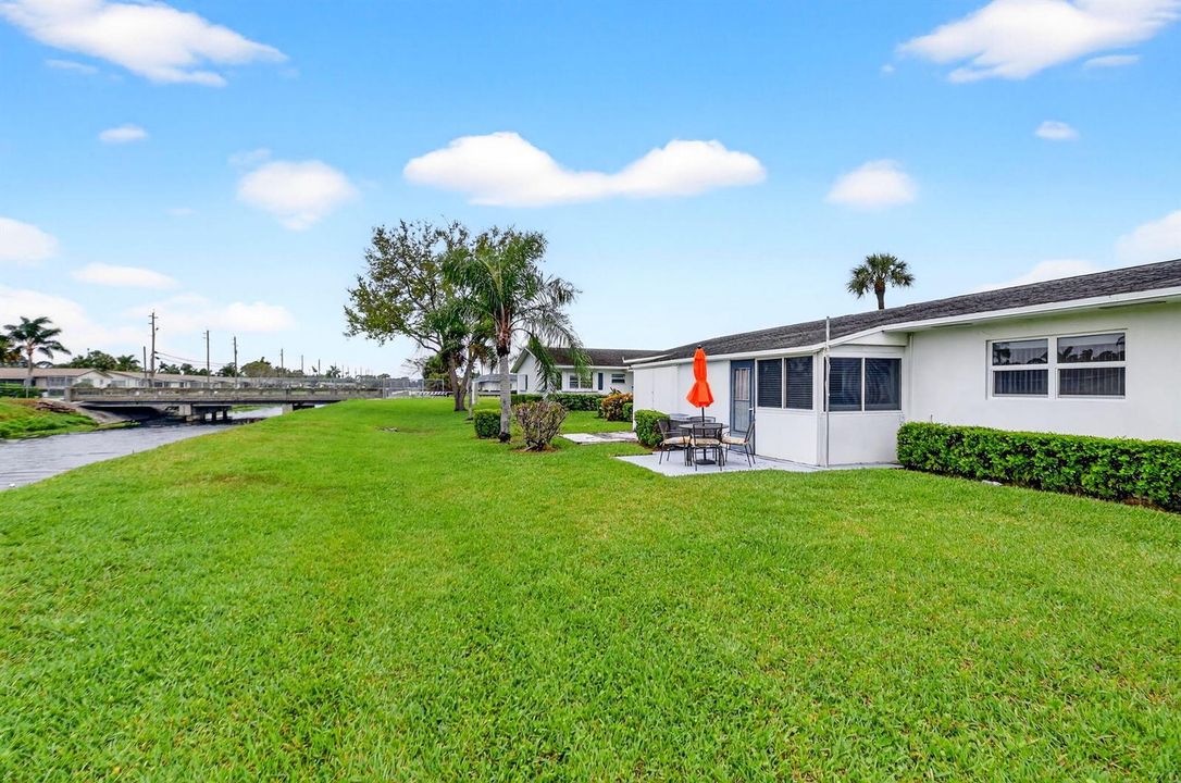 Expansive Green Space with Canal Views