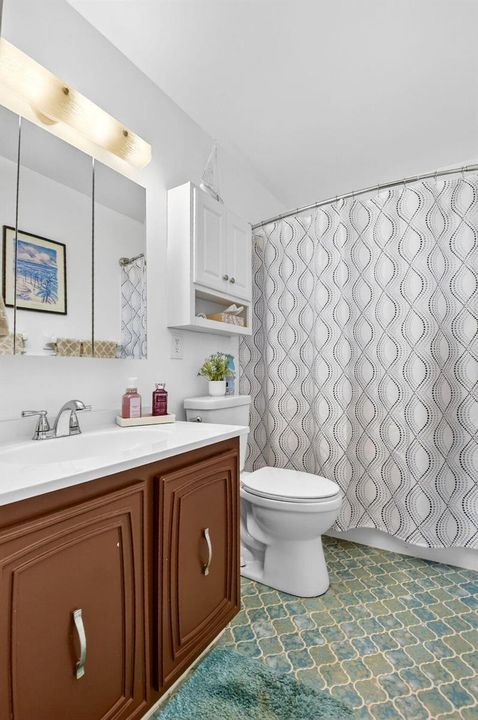 Bathroom With Vanity And Shower Combo