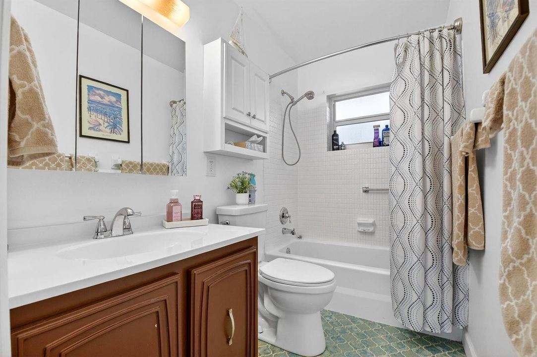 Full Bathroom With Tub And Shower Combo