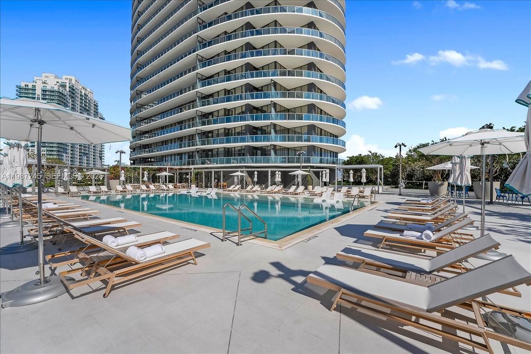 Full-Service Pool at Five Park Miami Beach with poolside drinks, dining, towel service and more!