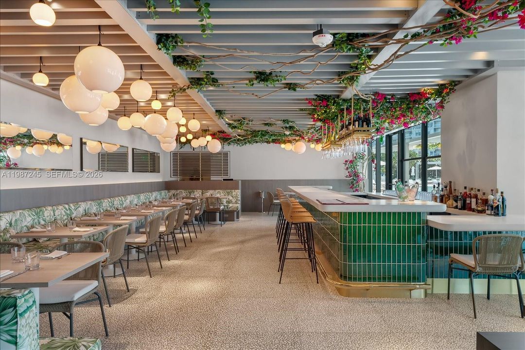 Indoor Portion of the poolside restaurant curated by James Beard Award-winning Chef Michelle Bernstein at Five Park Miami Beach.
