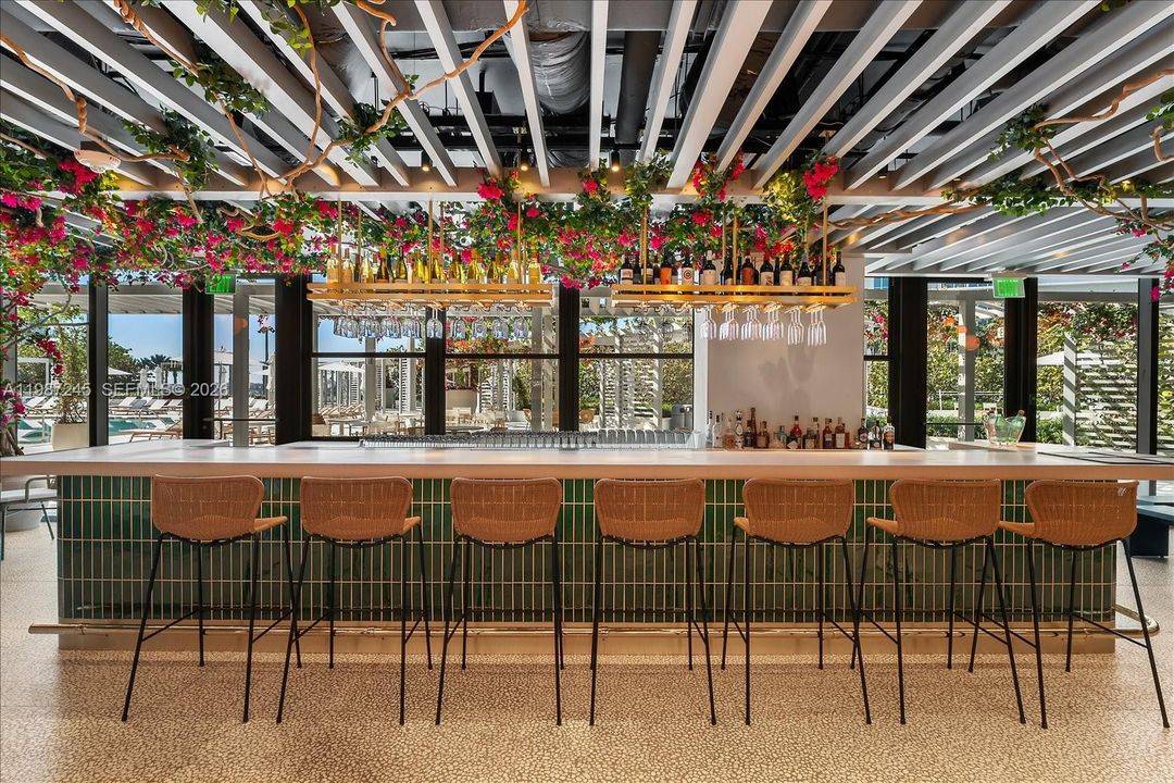 Bar Area in the Indoor Portion of the poolside restaurant curated by James Beard Award-winning Chef Michelle Bernstein at Five Park Miami Beach.