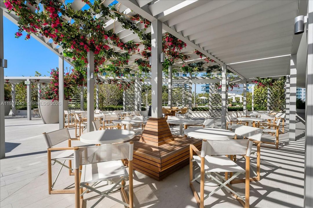 Outdoor Dining on the pool deck curated by James Beard Award-winning Chef Michelle Bernstein at the Full-Service Five Park Miami Beach.