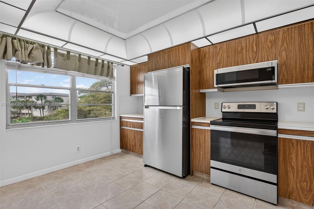 Bright kitchen with stainless steel appliances