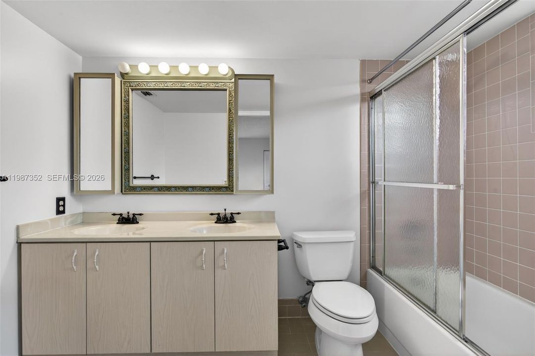 Ensuite bathroom with dual sink vanity
