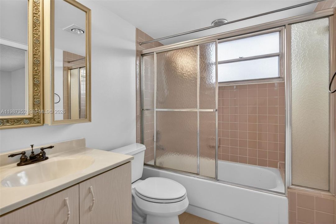 Corner unit with lots of natural light. Tub here, walk-in shower in 2nd bathroom.