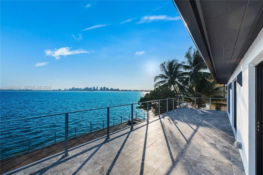 Oversized balcony with endless sunsets over Miami skyline
