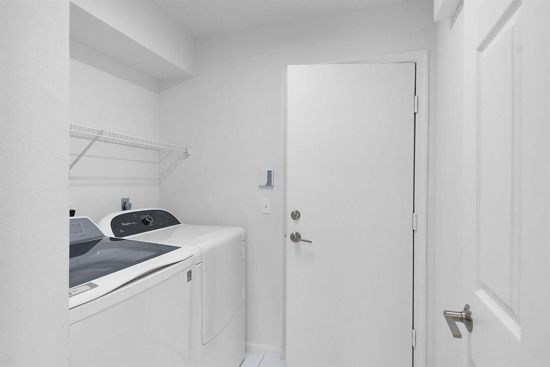 LAUNDRY ROOM AND ACCESS TO GARAGE