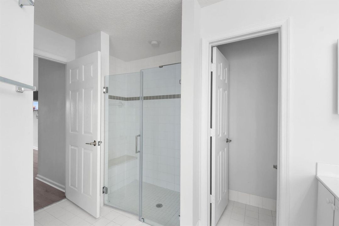 GLASS DOOR SHOWER PRIMARY BATHROOM