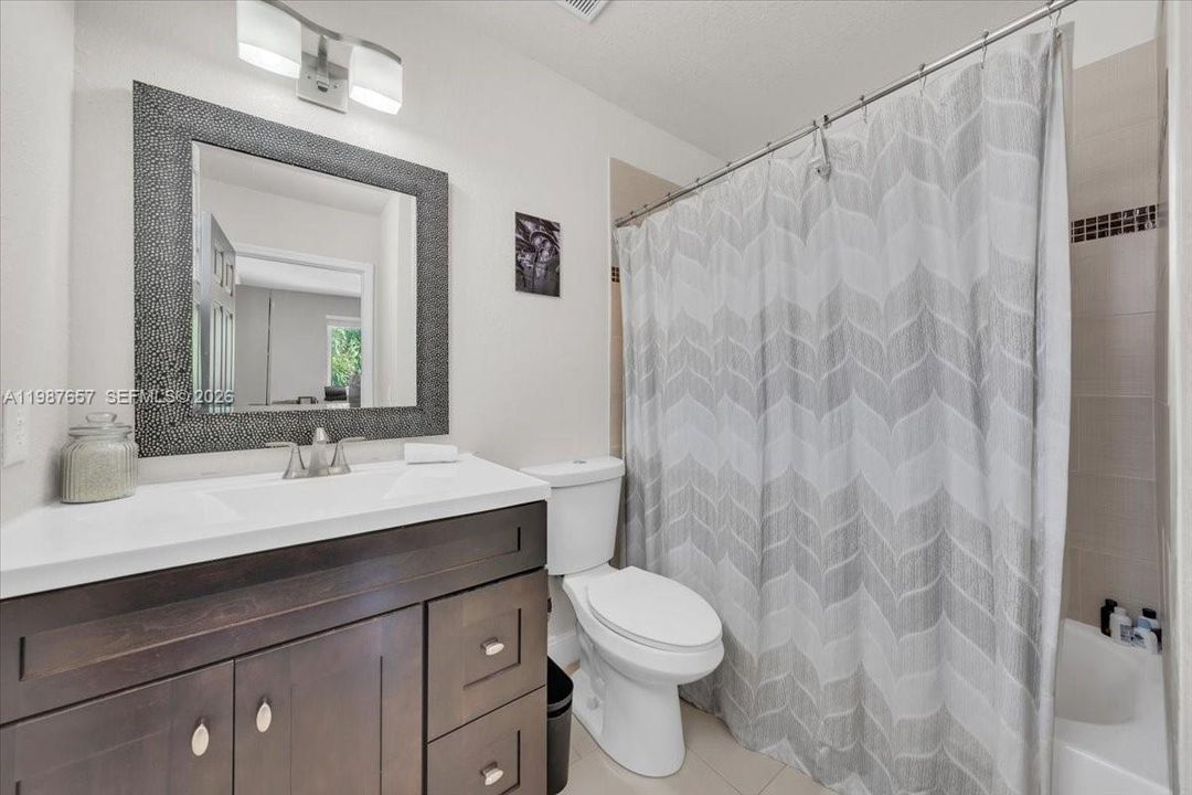 Tub + Shower in 2nd full bathroom.