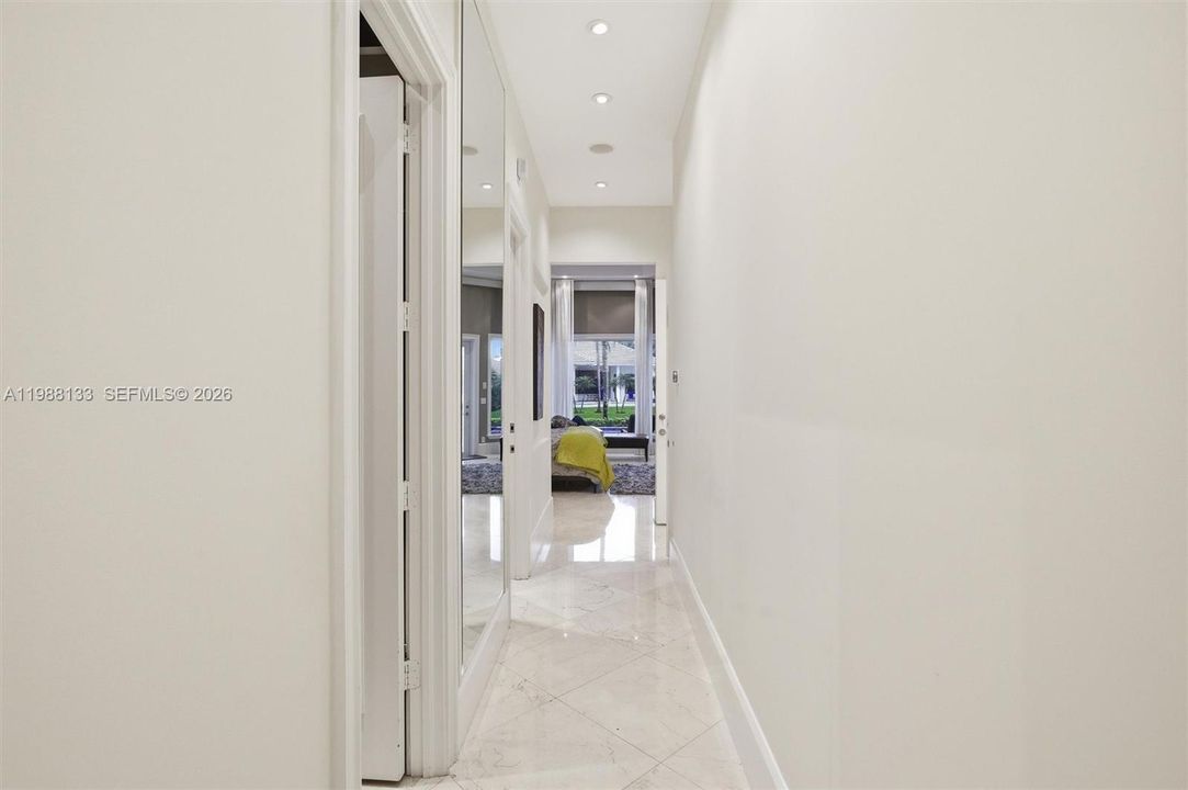 Hallway from primary bed to primary bath