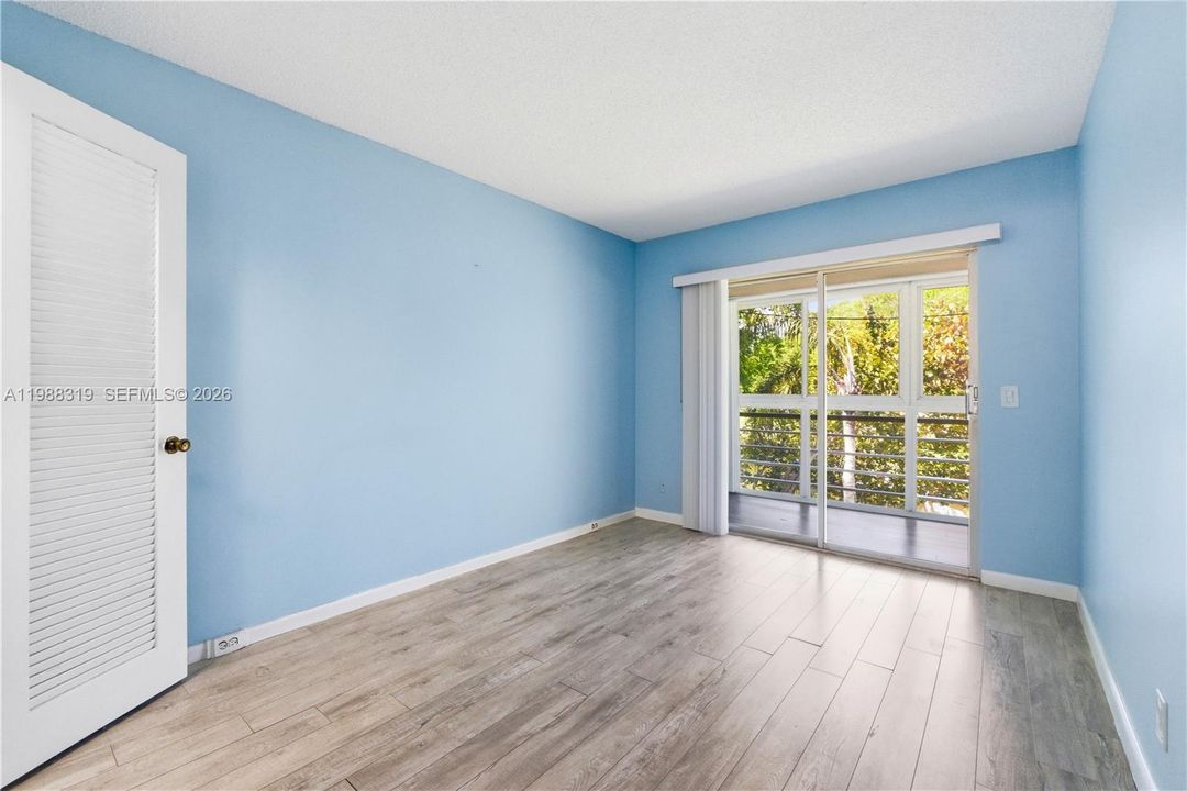 Primary  bedroom with Sliders