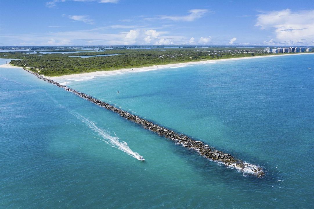 Boat Leaving Inlet