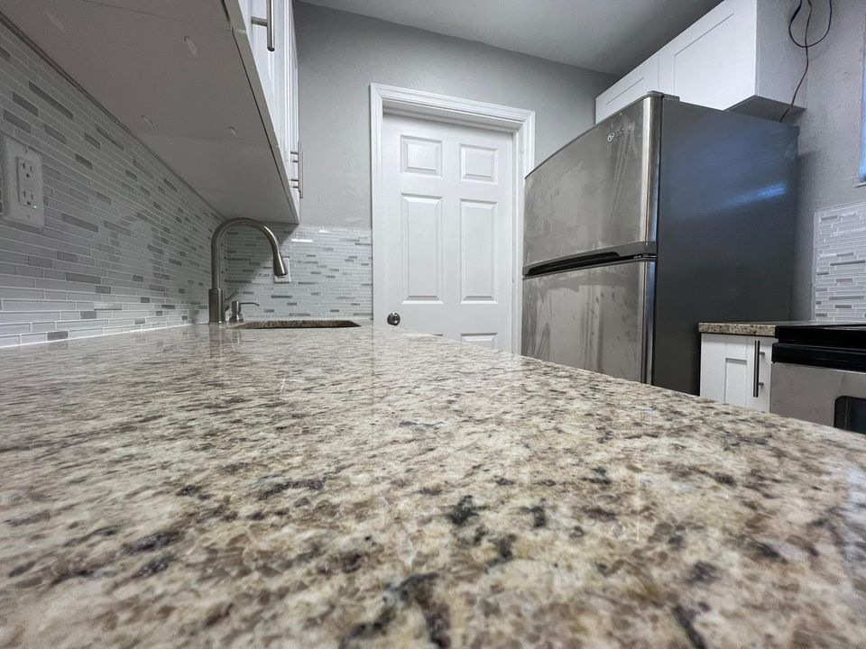 WOOD KITCHEN W/GRANITE COUNTERS