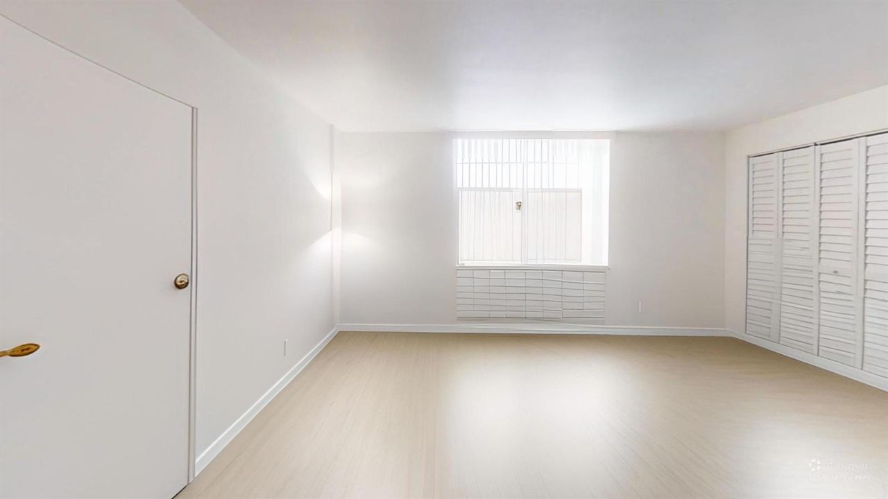 101-SE-Third-Ave-Bedroom-Defurnished 2