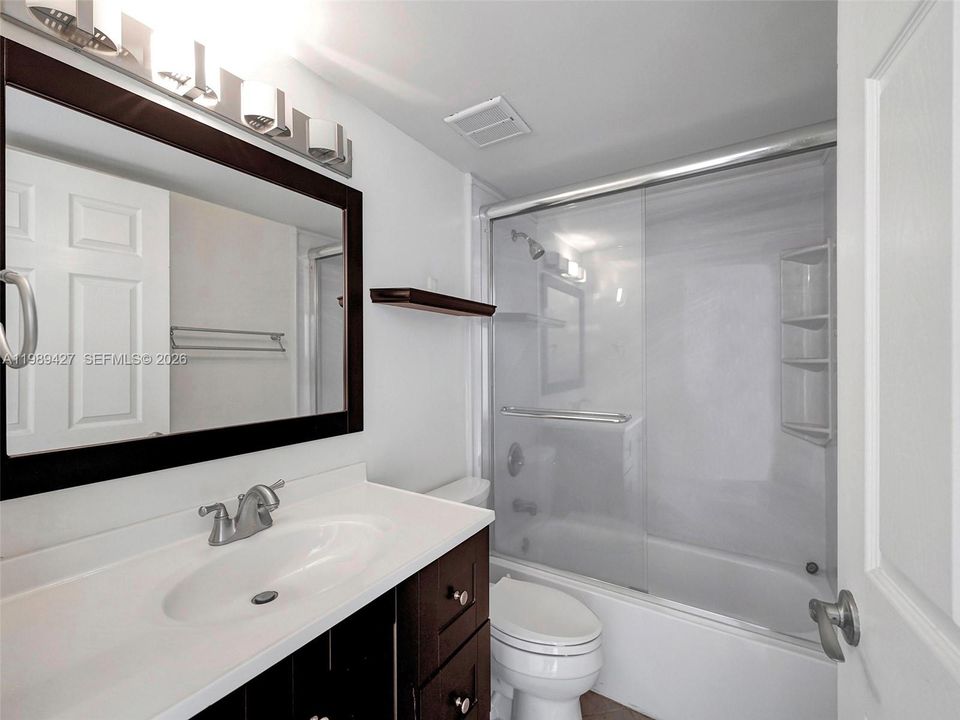 one of two full, updated bathrooms.