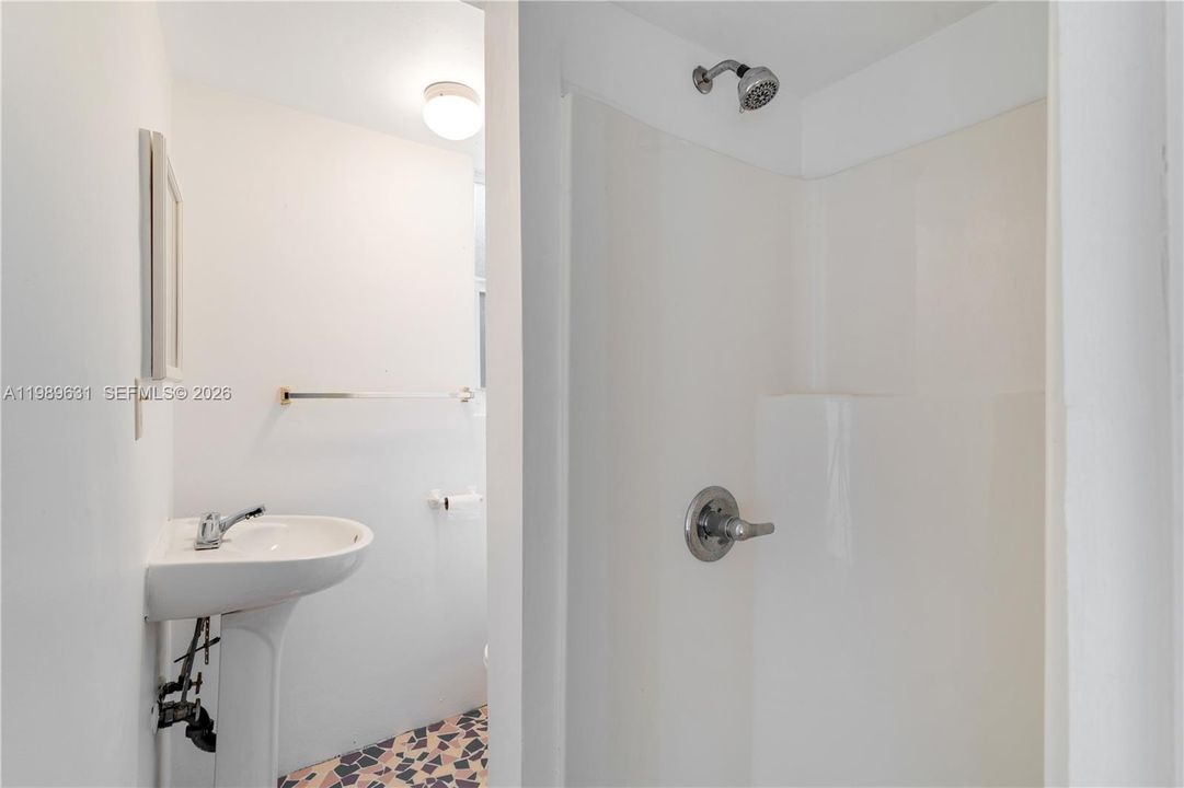 full bathroom next to exercise room