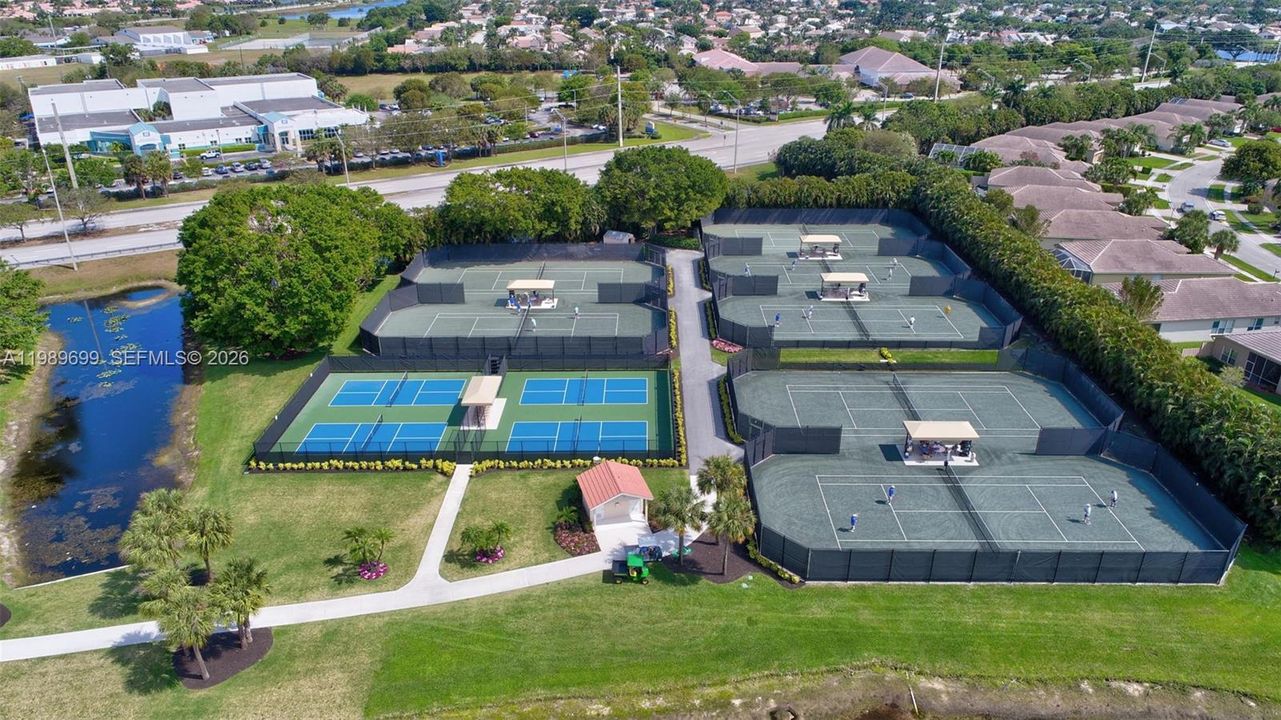 Located within exclusive Aberdeen Golf & Country Club, a mandatory membership community, residents enjoy access to championship golf, tennis, pickleball, resort-style pools, a state-of-the-art fitness and aquatics center, and multiple dining venues. A vibrant social calendar creates an active, connected lifestyle.