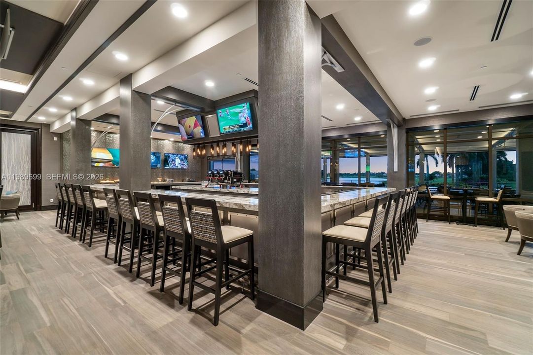Located within exclusive Aberdeen Golf & Country Club, a mandatory membership community, residents enjoy access to championship golf, tennis, pickleball, resort-style pools, a state-of-the-art fitness and aquatics center, and multiple dining venues. A vibrant social calendar creates an active, connected lifestyle.