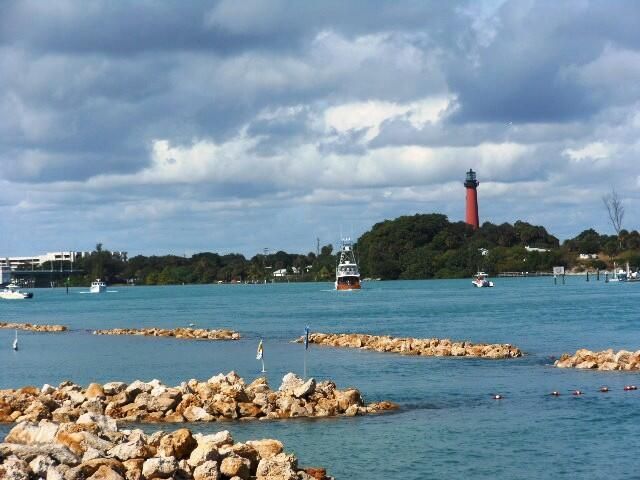 gorgeous inlet light house boat
