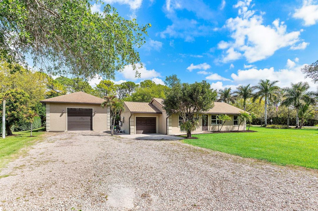 004-1751760thLaneNorth-TheAcreage-FL-334