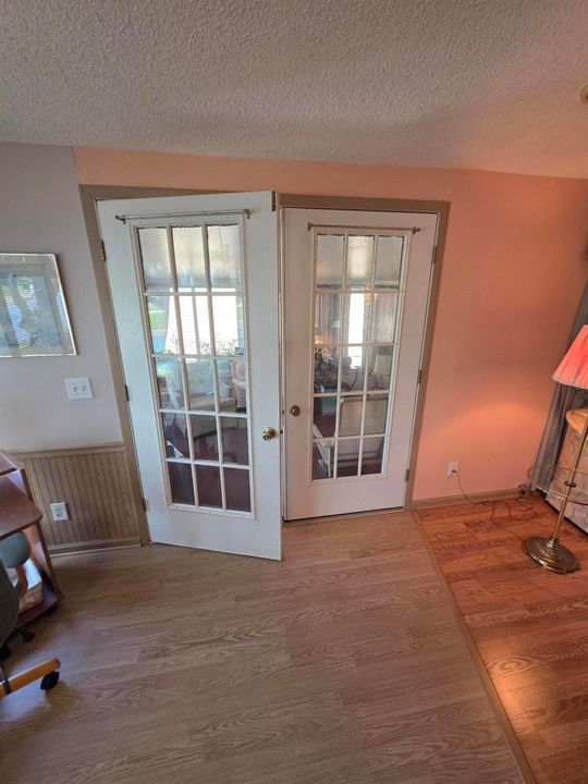Double glass french doors to the lanai.