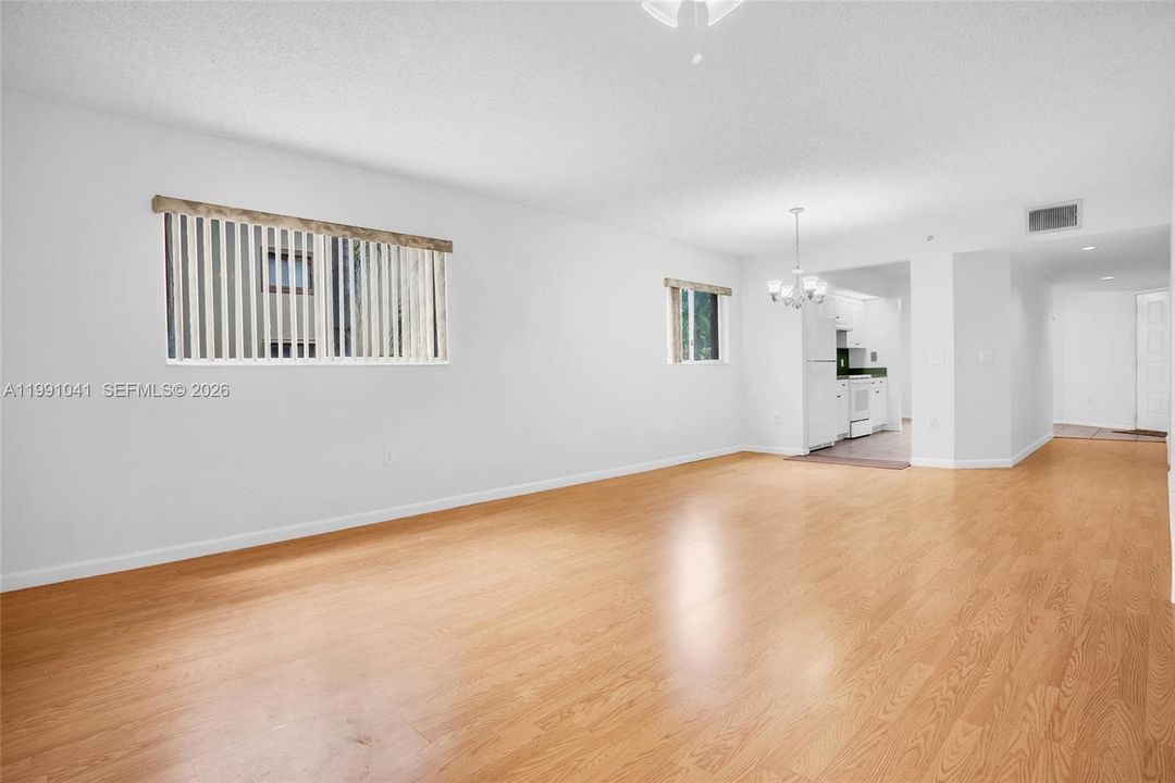 LARGE FAMILY ROOM WITH WINDOWS