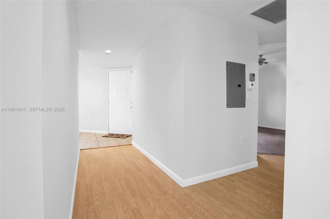 HALLWAY LEADING TO FRONT ENTRANCE