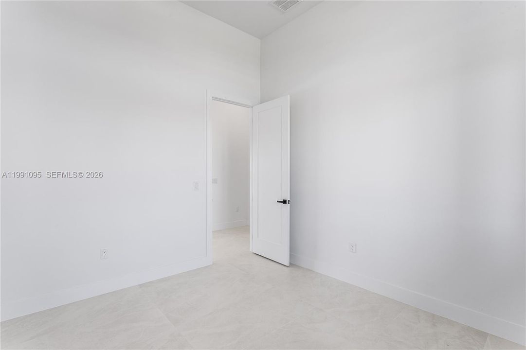 Versatile office/den offers the perfect space for working from home, a quiet study, or a cozy flex room.