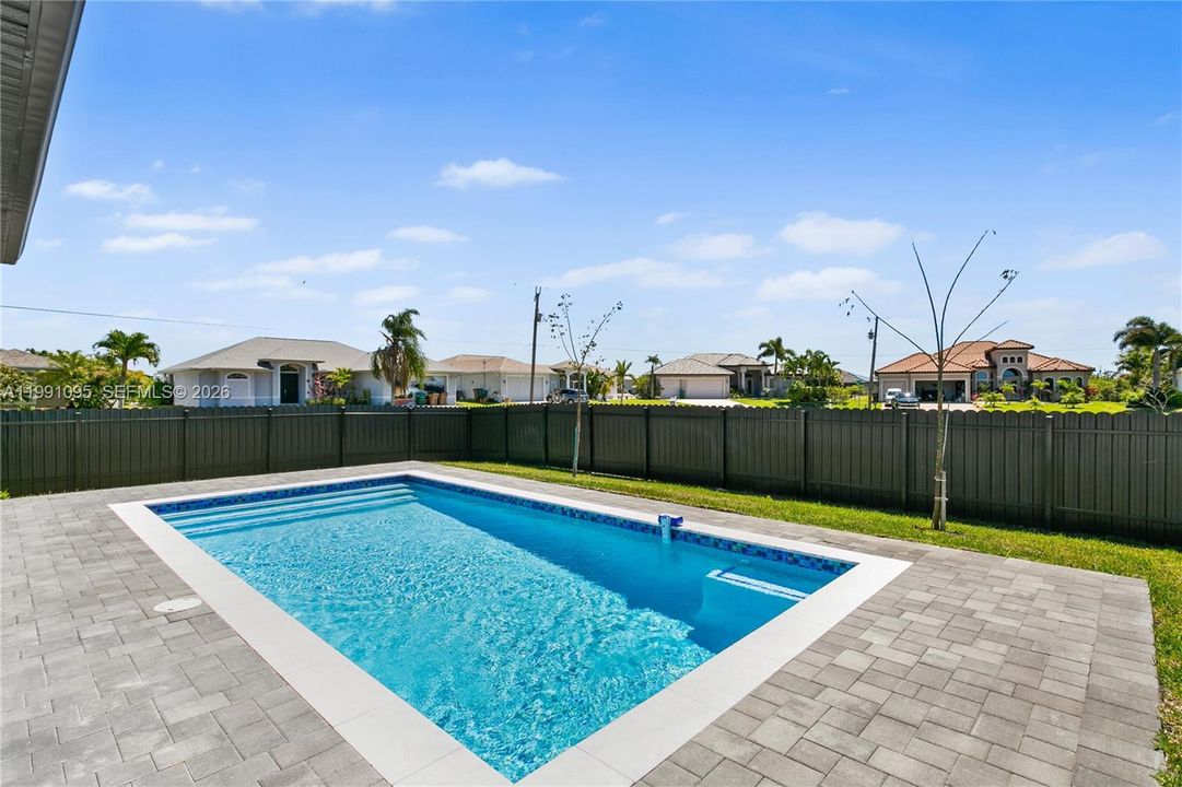Additional features include: 3-CAR GARAGE w/ extended storage space; FULLY FENCED YEAR for privacy & pets