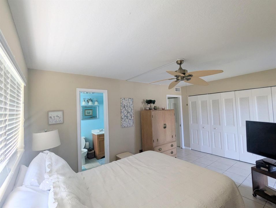 Large Bedroom w Wall of Closets