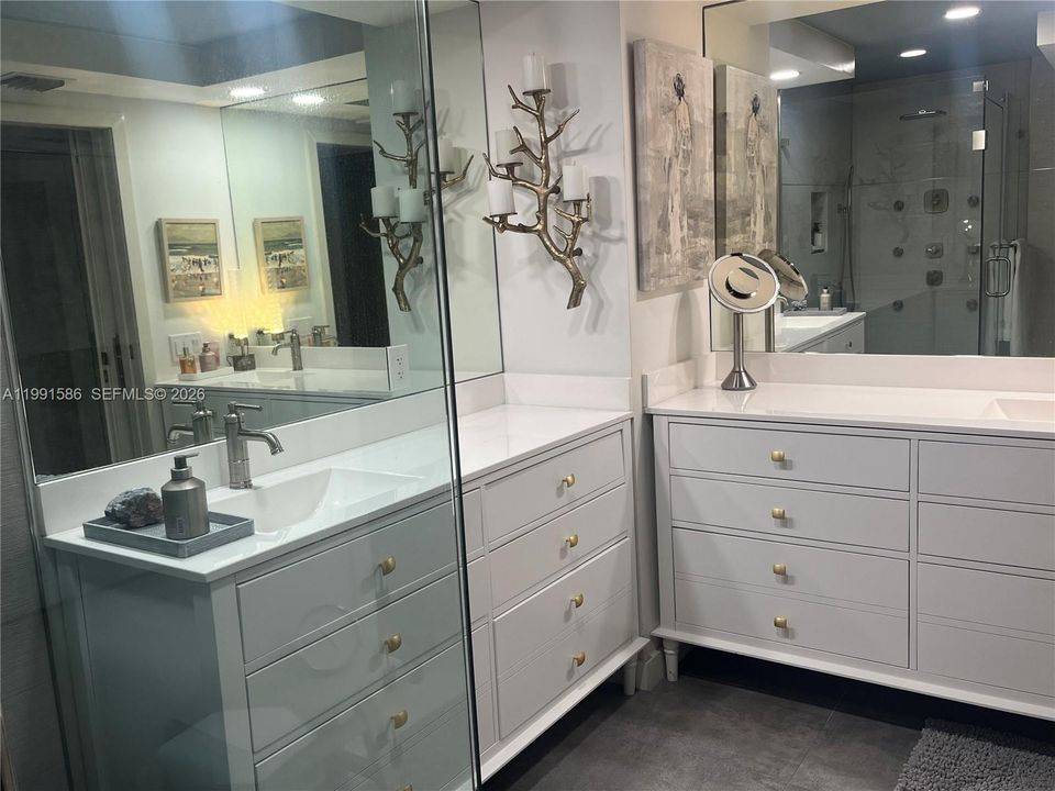Double solid wood vanities with built in power supply.
