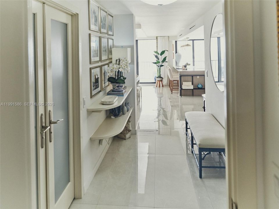 Large gallery foyer leading to main living space.