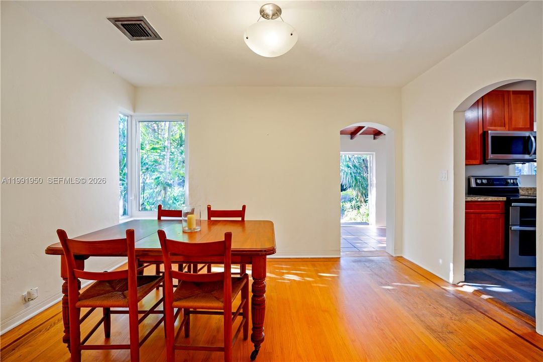 Dining area connecting to kitchen and main living spaces