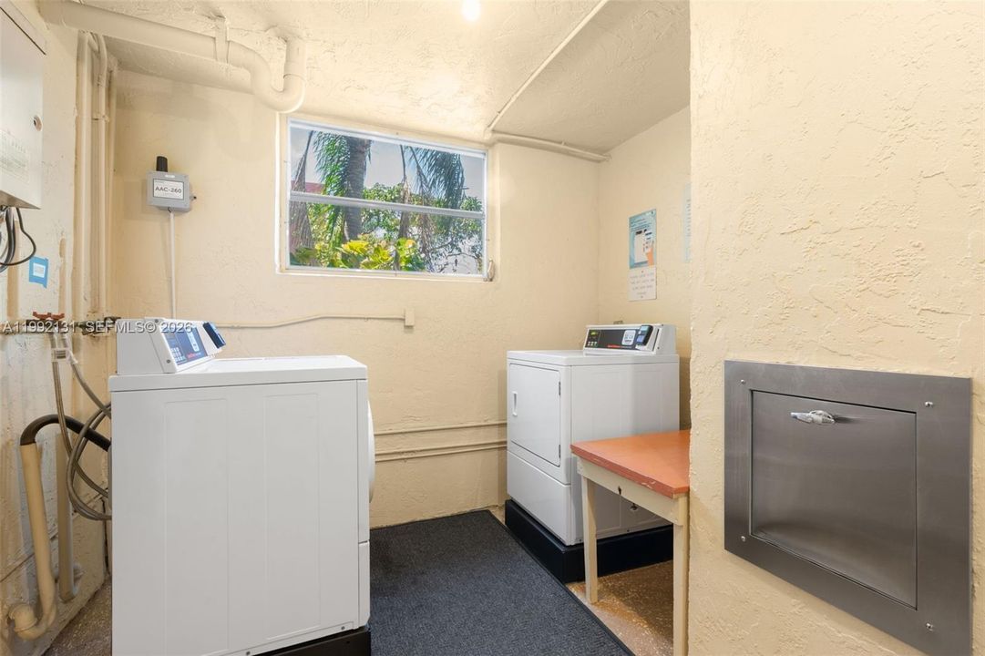 Community Laundry just steps from unit.