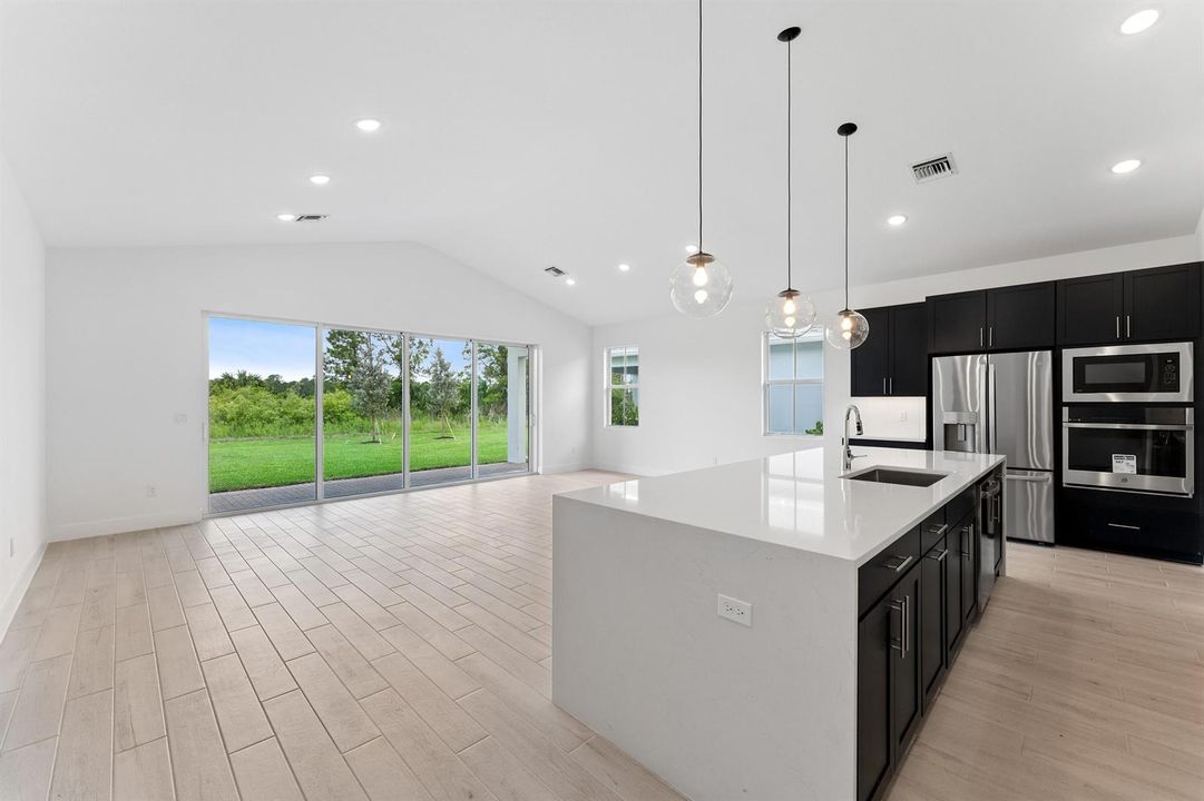 Kitchen, Great Room & Dining Area
