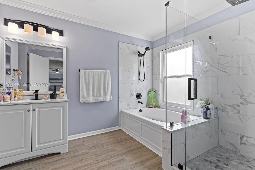 Master bathroom with shower and bath up