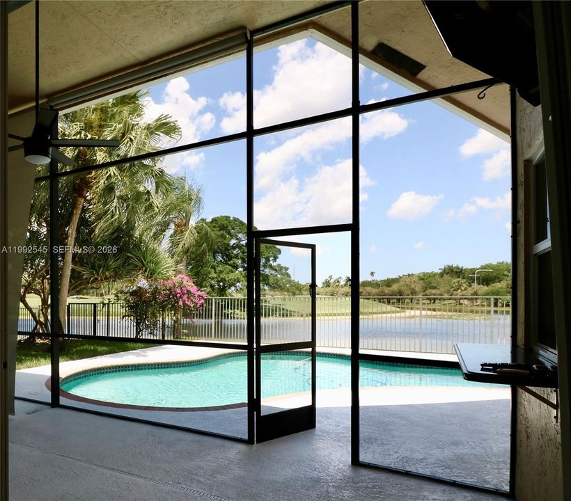 Screened porch from living/dinning to bar/kitchen & pool