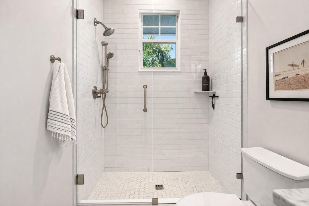 Modern spa-like bathroom with tropical v