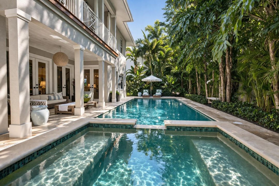 Luxurious backyard patio and pool oasis