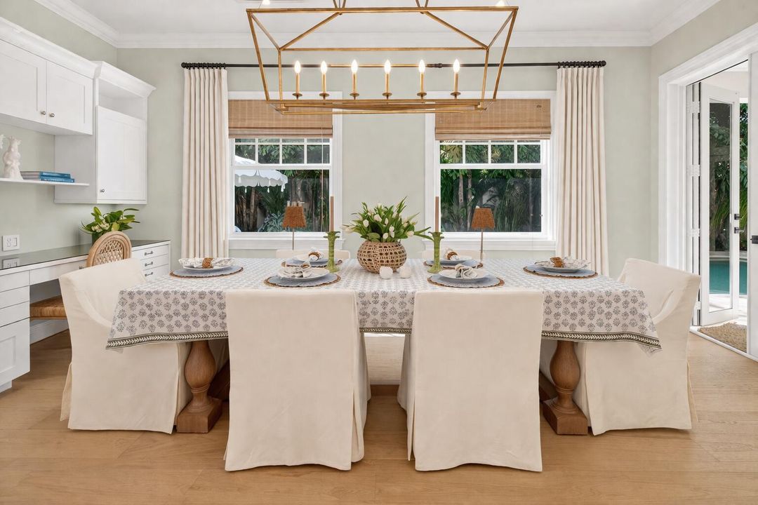 Coastal farmhouse dining with symmetry