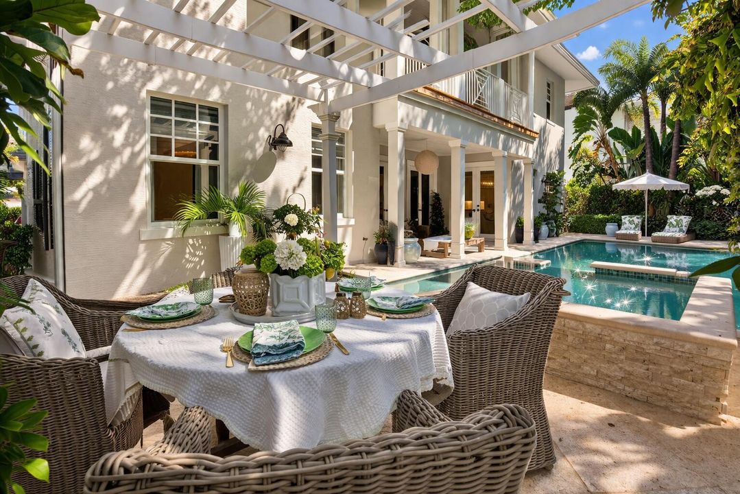 Tropical backyard retreat with poolside