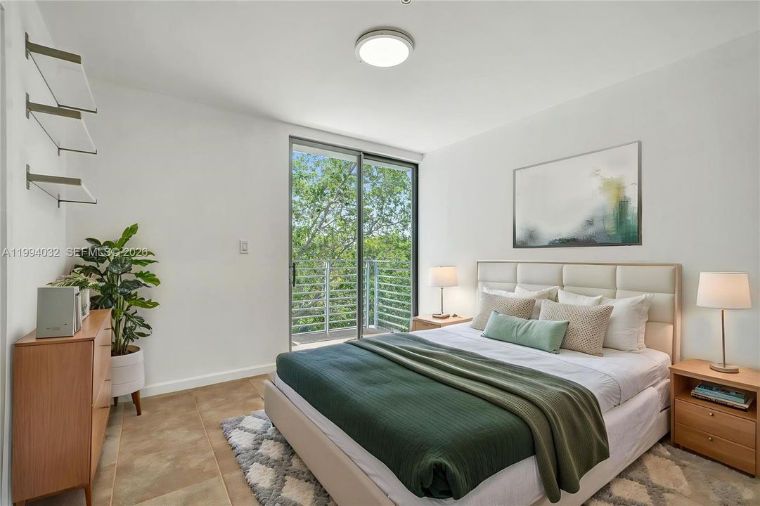 2nd ensuite bedroom with balcony facing the road