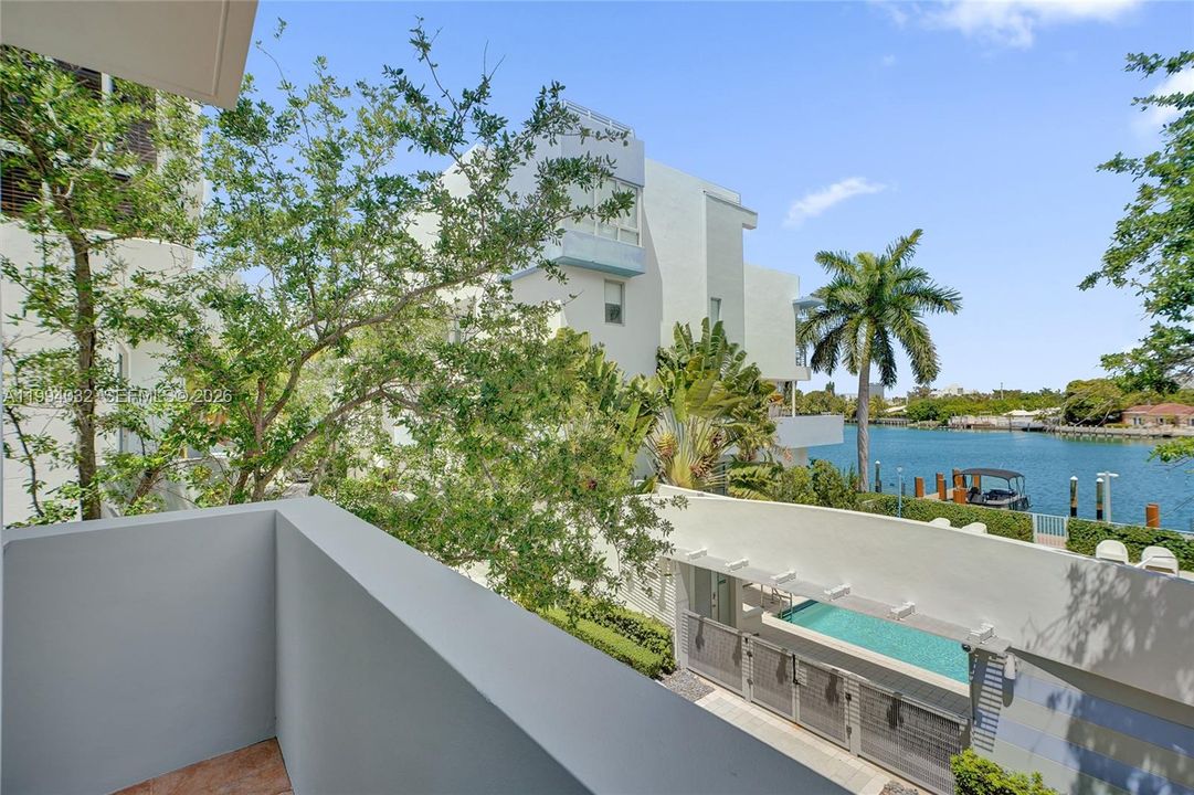2nd floor with balcony over looking the pool & bay