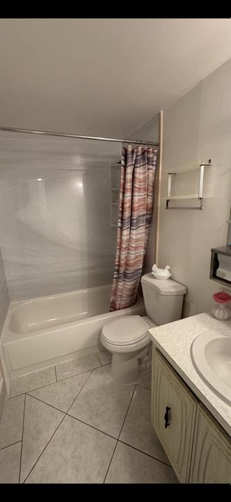 Hall bath with tub and shower