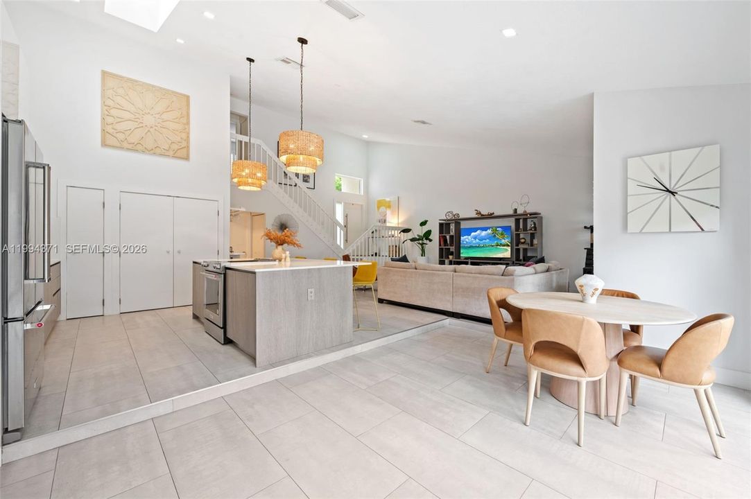Dining, kitchen and living areas